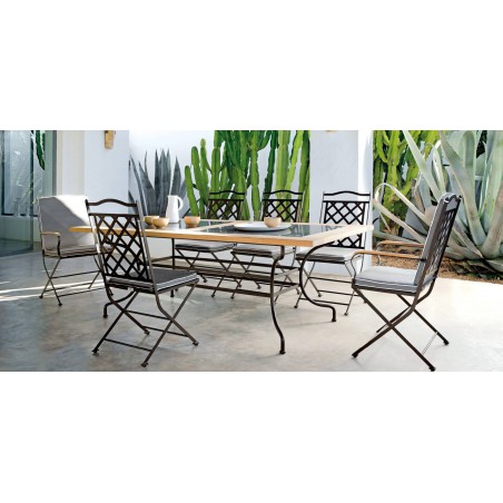 Rectangular outdoor dining table Capri by Manutti - Rubbed brown frame, border teak with stone top