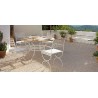 Round outdoor dining table Capri by Manutti - White frame, teak top